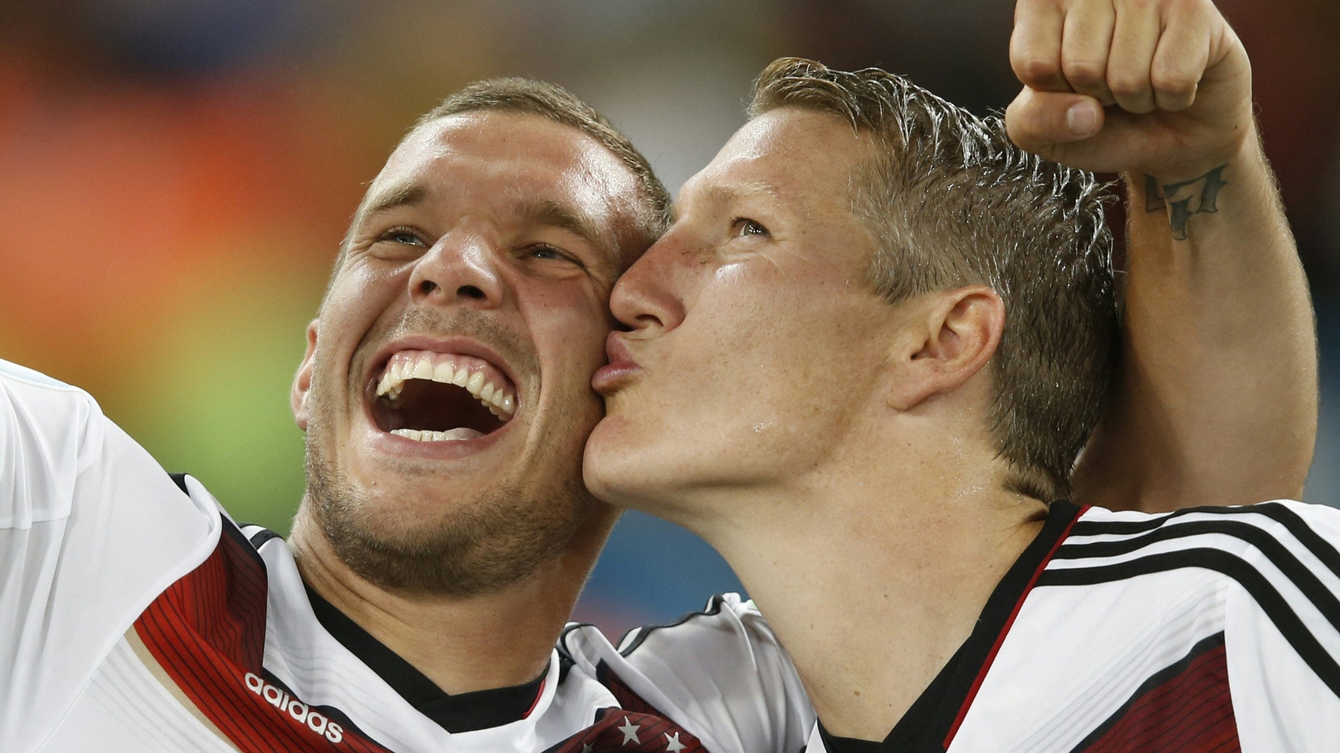 Podolski und Schweinsteiger als Weltmeister 2014